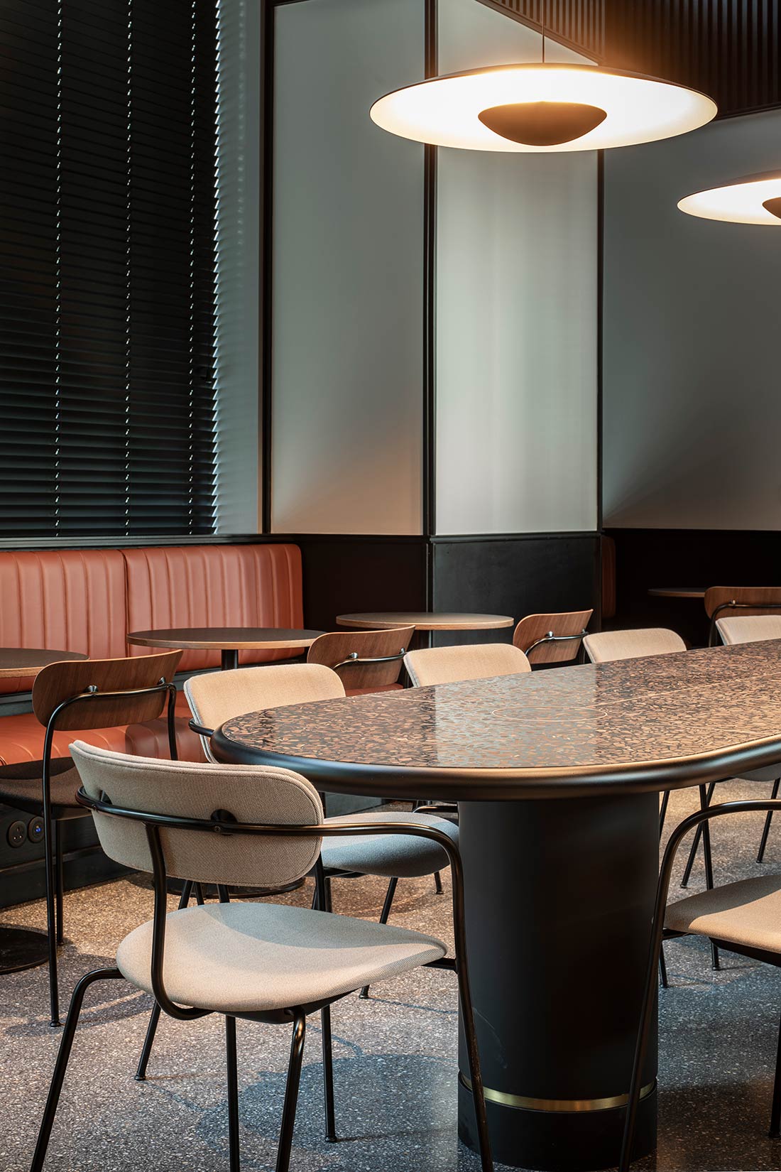 Seating area with tables and chairs Seating area with tables and chairs