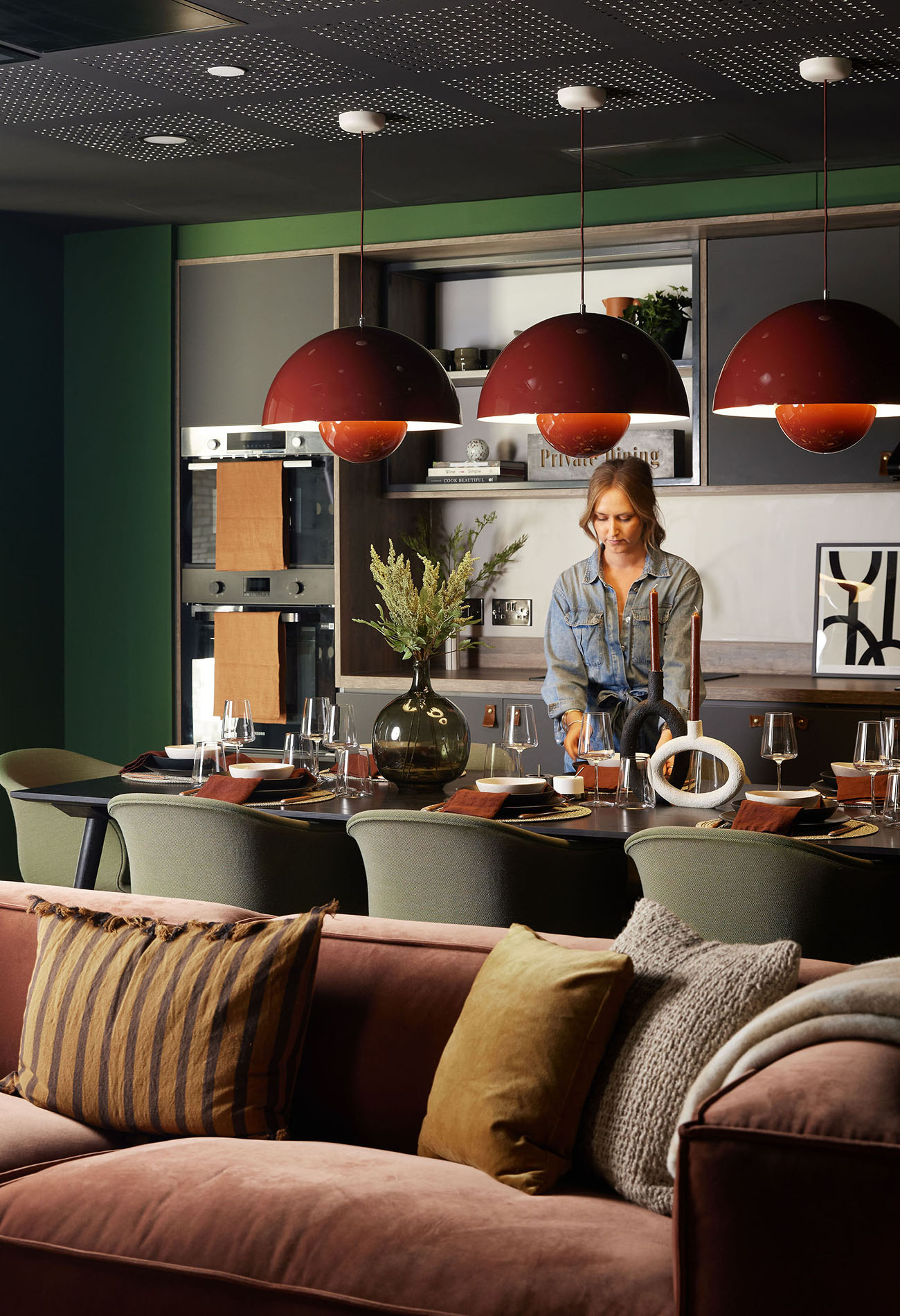 Lady setting dining table Lady setting dining table