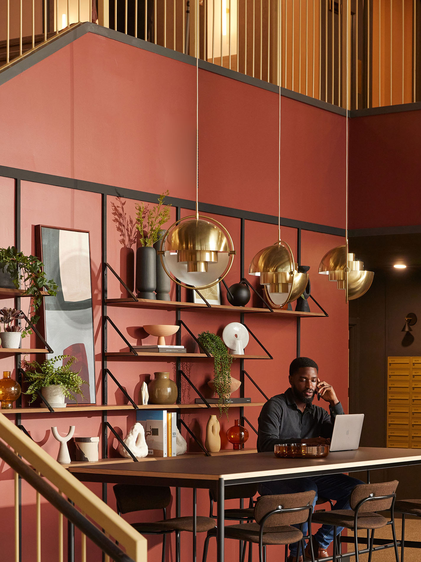 Man with laptop at large desk Man with laptop at large desk